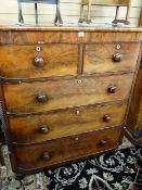 A VICTORIAN MAHOGANY CHEST of two short over three long drawers with mother of pearl escutcheons and