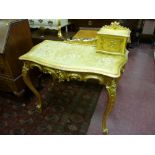 A LOUIS XVI STYLE GILT DECORATED SALON TABLE with single top cupboard and decorative back rail,
