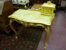 A LOUIS XVI STYLE GILT DECORATED SALON TABLE with single top cupboard and decorative back rail,