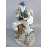 A LLADRO FIGURAL GROUP of seafaring gentleman with a model boat in hand and a young boy by his side,