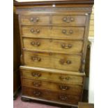 A VICTORIAN MAHOGANY CHEST ON CHEST having an inverted cornice with Greek Key decoration over a