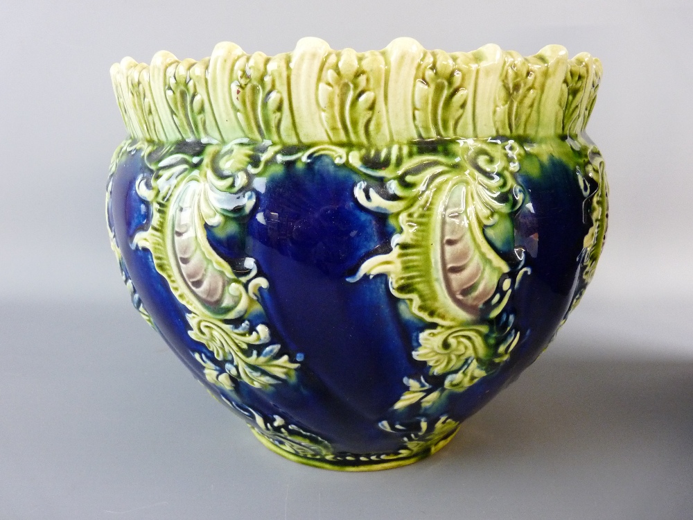 A VICTORIAN MAJOLICA POTTERY JARDINIERE, relief decorated on a cobalt ground, marked 'Albert' to the