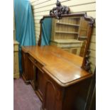 A VICTORIAN MAHOGANY MIRRORBACK CHIFFONIER SIDEBOARD, the mirror frame with heavy open carved