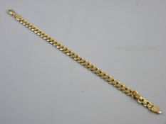 A NINE CARAT GOLD FLAT CURB BRACELET, 14 grms