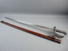 A GOOD VICTORIAN OFFICER'S CEREMONIAL SWORD having a scrolled and pierced steel basket with ray skin