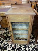 AN EDWARDIAN LINE INLAID MAHOGANY MUSIC CABINET, the single glazed door opening to reveal velvet