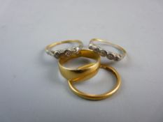 FOUR VARIOUS ANTIQUE RINGS to include an eighteen carat gold wedding band, an eighteen carat gold