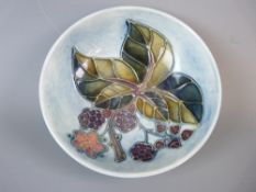 A MOORCROFT BLACKBERRY SHALLOW BOWL, 12 cms diameter, decorated on a blue/grey ground, impressed