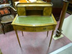 A REPRODUCTION WALNUT LADY'S WRITING DESK, the top shelf section with concave drawer and lower