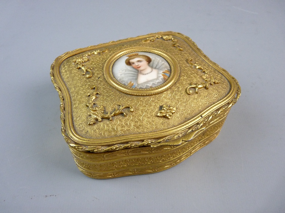 A FRENCH GILDED METAL JEWELLERY BOX, mid to late 19th Century, the lid with central painted