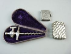 A HALLMARKED SILVER VESTA CASE, one other and a cased Champagne barrel tap, Birmingham 1921, the