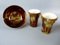 THREE PIECES OF CARLTONWARE ROUGE ROYALE to include a pair of stork pattern ribbed vases with gilt