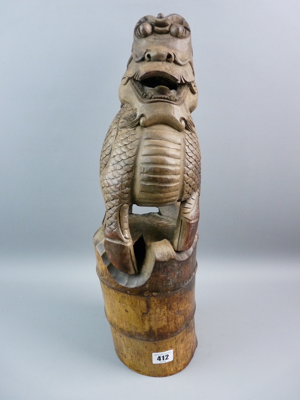A CARVED BAMBOO FIGURE OF QILIN (Chinese Unicorn), a mythical beast symbolizing good luck and