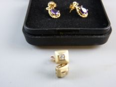 A PAIR OF NINE CARAT GOLD SQUARE CUT EARRINGS with butterfly fixings, each having a centre square