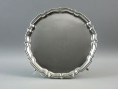 A CHESTER HALLMARKED SILVER CARD TRAY with wavy edge border on four hoof feet, Chester 1918, 18.2