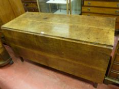 AN ANTIQUE OAK SIX LEGGED DINING TABLE, unusual and simple construction, twin drop leaf six plank