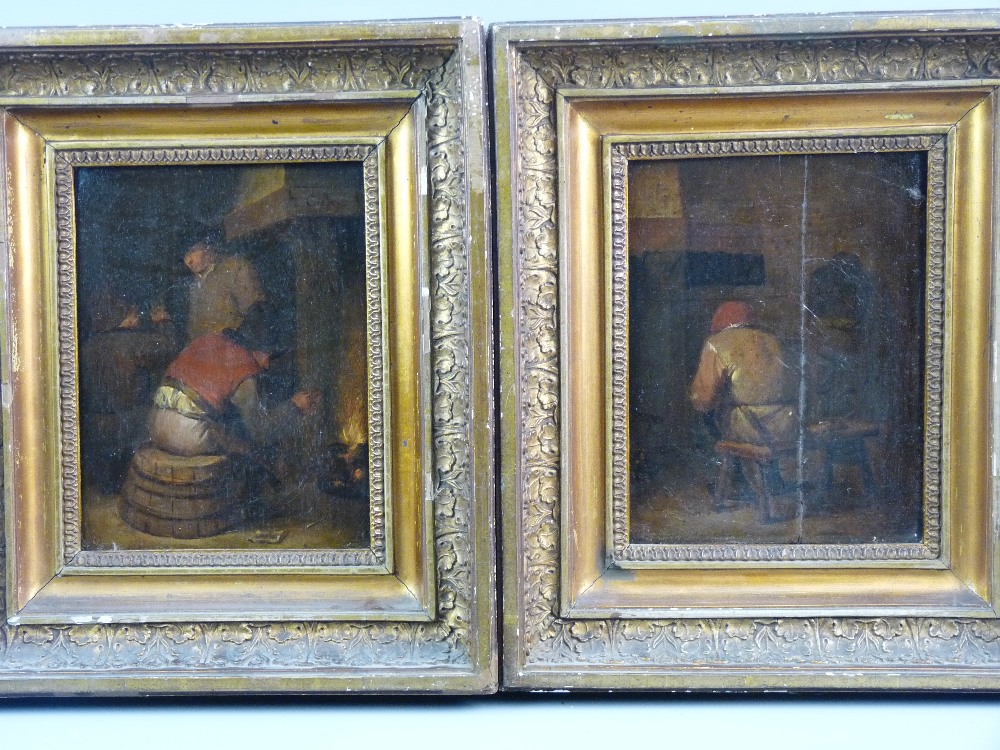 AFTER CORNELIS PIETERSZ BEGA oils on panel, a pair - interior scenes, two peasants at a fireside and