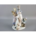 A LLADRO FIGURAL GROUP 'The Snowman', no. 5713 to the base, 21 cms high