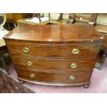 A GEORGIAN MAHOGANY THREE DRAWER BOW FRONTED CHEST, the cock beaded drawers with stag decorated oval