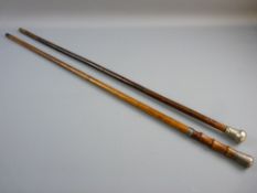 TWO BAMBOO WALKING CANES, one having a hallmarked silver collar and top, 93 cms long, the other with