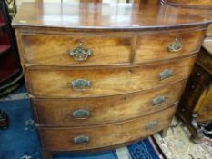 A VICTORIAN MAHOGANY BOW FRONTED CHEST of two short over three long drawers, 103 cms high, 106 cms