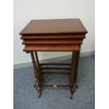 A GOOD QUARTETTO OF EDWARDIAN MAHOGANY SIDE TABLES with beaded edge top decoration on turned slender