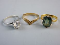 TWO NINE CARAT GOLD DRESS RINGS and a silver dress ring with cz, 7 grms total