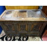 A 19th CENTURY OAK MULE CHEST, the triple panel hinged top over a carved frieze and border