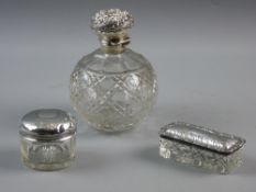 THREE DRESSING TABLE ITEMS with hallmarked silver tops to include an oblong lidded box, Birmingham