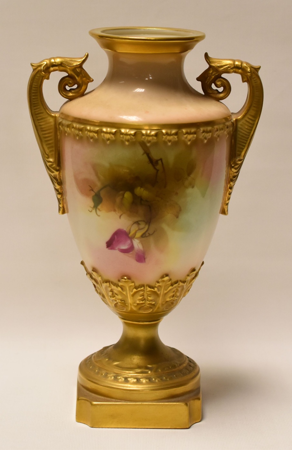 A ROYAL WORCESTER TWIN-HANDLED VASE raised on a chamfered square base and decorated with wild-roses, - Image 2 of 2