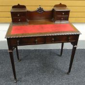 AN EDWARDIAN LADY'S MAHOGANY WRITING DESK having a single long drawer to the base and with upper