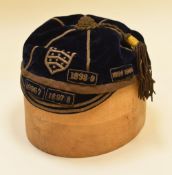 A GLOUCESTER RUGBY UNION CAP with four season dates applied being 1896-7, 1897-8, 1898-9, 1899-1900