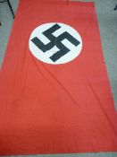 A LARGE GERMAN NAZI PARTY FLAG, 125 x 215 cms approximately