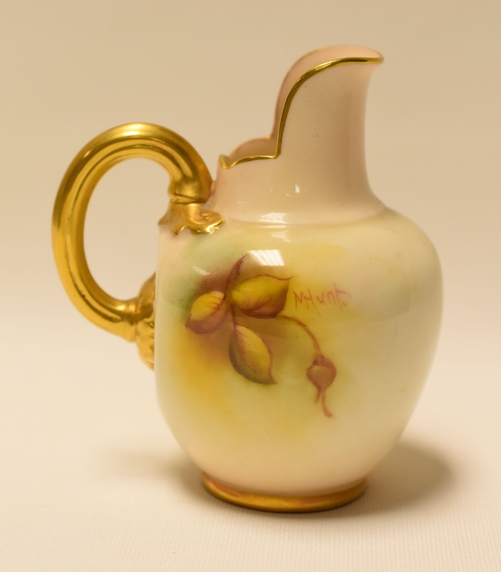 A SMALL ROYAL WORCESTER JUG with gilded handle and upright spout, painted with roses by Millie Hunt, - Image 2 of 2