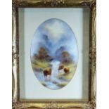 FRAMED OVAL ROYAL WORCESTER PLAQUE of concave form, painted with a Scottish Highland scene of