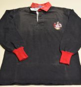 UNKNOWN RUGBY UNION JERSEY in black with red collar and bearing stitched heraldic crest and stitched