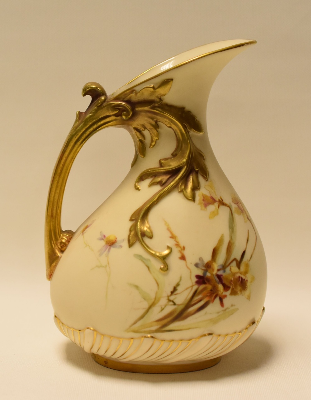 A ROYAL WORCESTER BLUSH IVORY JUG with gilded naturalistic handle and painted with wild-flowers, - Image 2 of 2