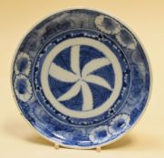 A SMALL BLUE & WHITE IMARI DISH typically decorated in the early nineteenth century style, four