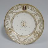 UNKNOWN ENGLISH PORCELAIN PLATE with three painted oval cameo portraits to the border, 24cms diam