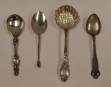 FOUR CONTINENTAL SILVER SPOONS each with a variety of designed handles and terminals including a