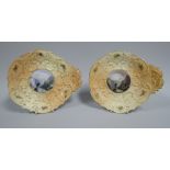 A PAIR OF ROYAL WORCESTER DISHES moulded with foliate handles and foliate borders featuring