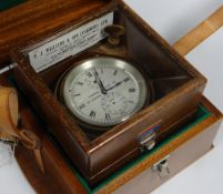 A THOMAS MERCER LTD NAUTICAL CHRONOMETER No.19800 bearing Roman numerals to the silvered dial and