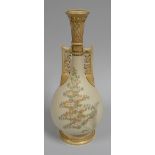 A ROYAL WORCESTER TWIN HANDLED VASE with narrow neck and openwork to the neck and handles on a