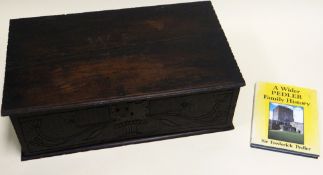 AN EIGHTEENTH CENTURY OAK BIBLE BOX of primitive plank form and with original lock-plate, the facade