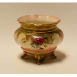 A ROYAL WORCESTER MINIATURE PLANTER on four feet, with crimped neck and painted with flowers,