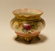 A ROYAL WORCESTER MINIATURE PLANTER on four feet, with crimped neck and painted with flowers,