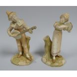A PAIR OF ROYAL WORCESTER MUSICIAN SPILL-HOLDERS on naturalistic bases and stood against stumps