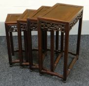 A CHINESE ROSEWOOD NEST OF FOUR COFFEE TABLES