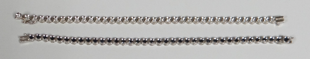 TWO CONTINENTAL SILVER TENNIS BRACELETS