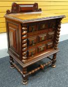 A NINETEENTH CENTURY DUTCH ROSEWOOD CHEST-ON-STAND with three panelled long doors and barley-twist